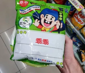 green bag of kuai kuai (乖乖), taiwanese snacks