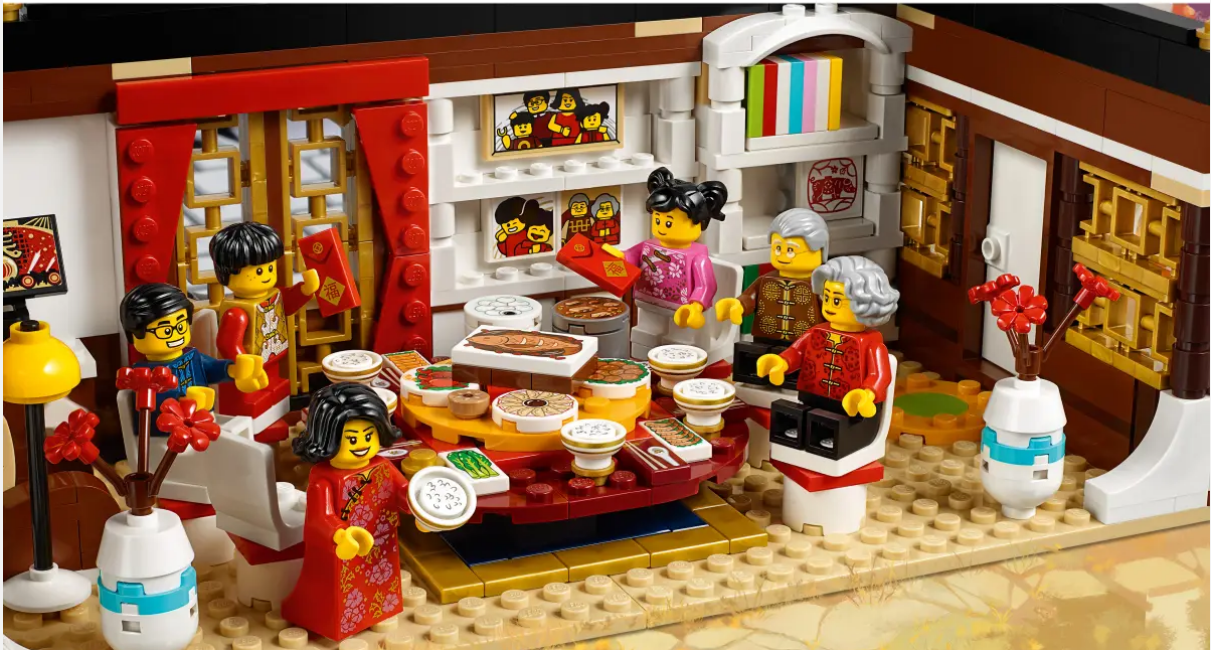 lego display of a family eating a lunar new year dinner